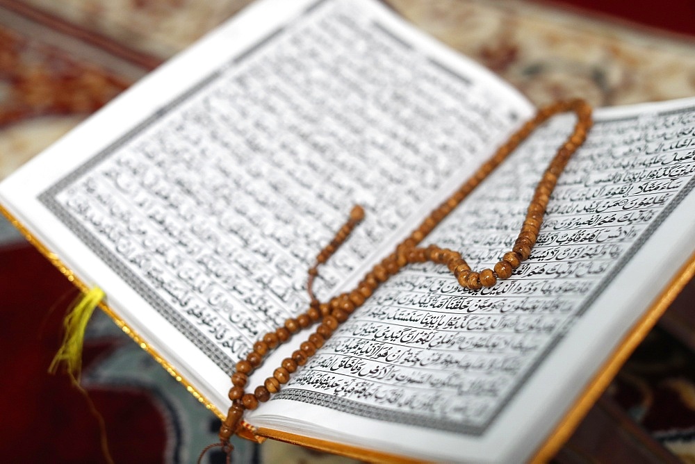 Arabic Holy Quran (Koran) with prayer beads (tasbih), Jamiul Islamiyah Mosque, Ho Chi Minh City, Vietnam, Indochina, Southeast Asia, Asia