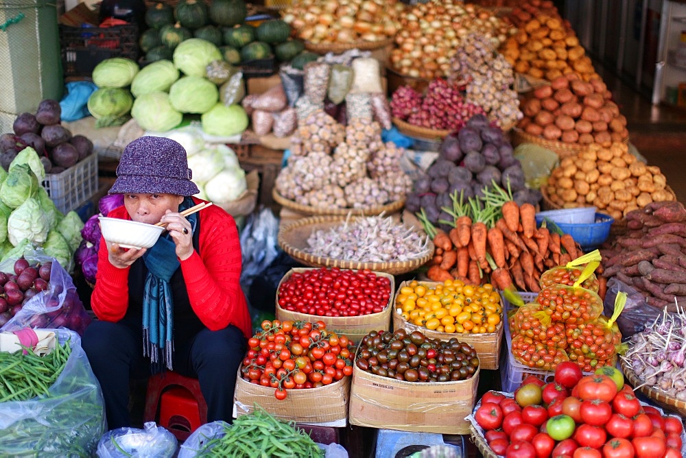 Woman selling fresh vegetables on market, Dalat, Vietnam, Indochina, Southeast Asia, Asia