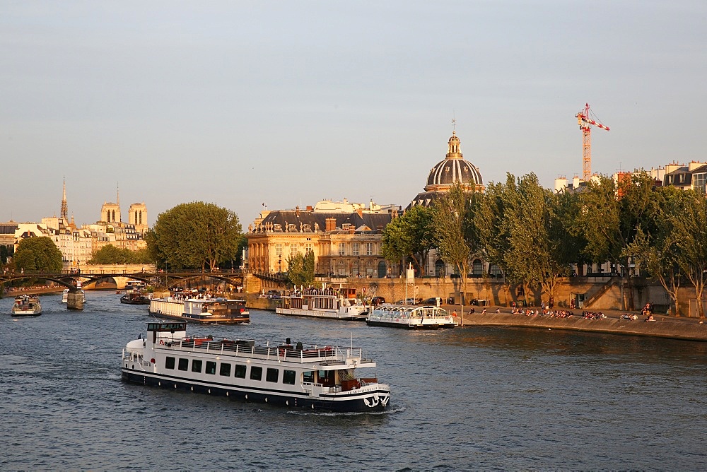 Tourist boat on the River Seine in Paris, France, Europe