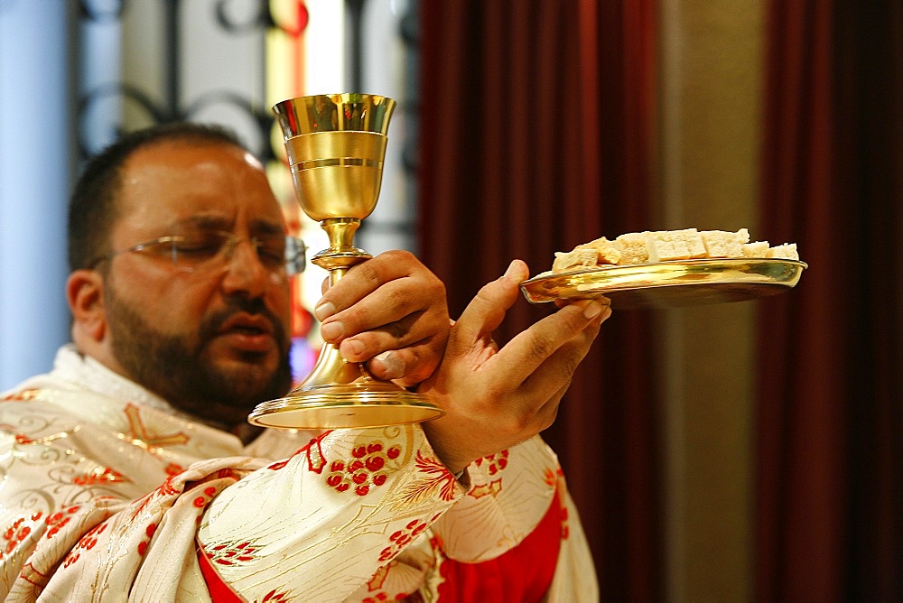 Melkite priest celebrating Mass, Nazareth, Galilee, Israel, Middle East