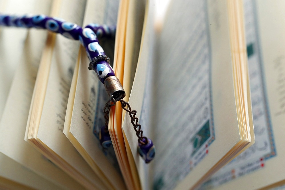 Arabic Holy Quran and prayer beads, Vietnam, Indochina, Southeast Asia, Asia