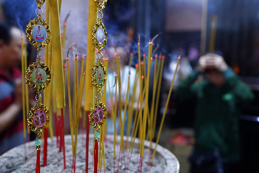 Close-up of incense sticks burning, Thien Hung Buddhist temple, Ho Chi Minh City (Saigon), Vietnam, Indochina, Southeast Asia, Asia