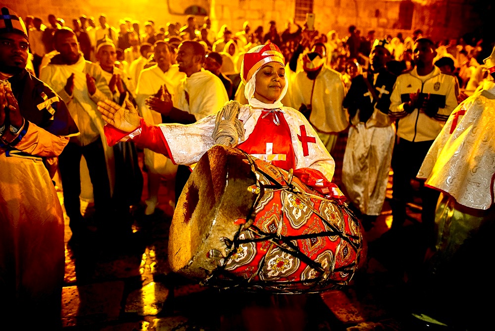 Ethiopian Orthodox Christians celebrating Easter vigil outside the Church of the Holy Sepulchre, Jerusalem, Israel, Middle East