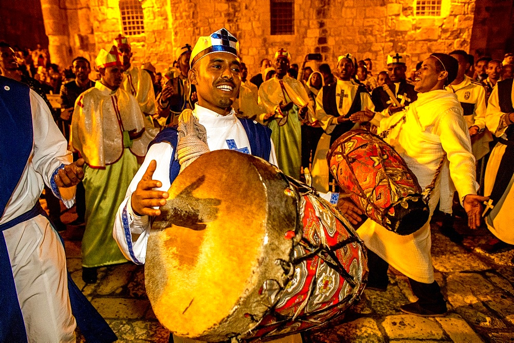 Ethiopian Orthodox Christians celebrating Easter vigil outside the Church of the Holy Sepulchre, Jerusalem, Israel, Middle East