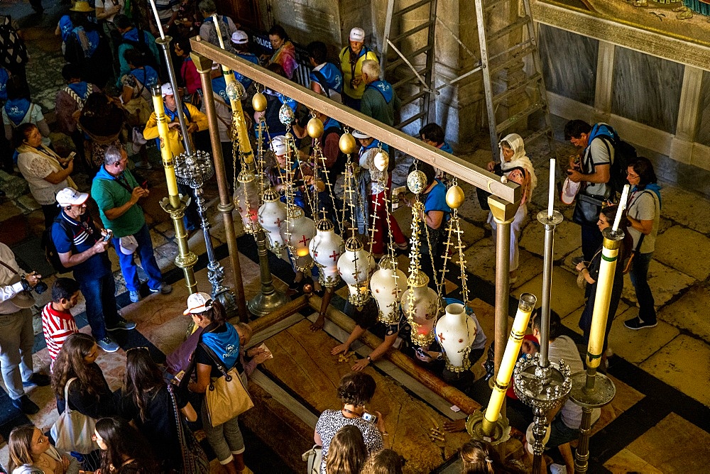 Christian pilgrims and tourists at the Church of the Holy Sepulchre, Jerusalem, Israel, Middle East