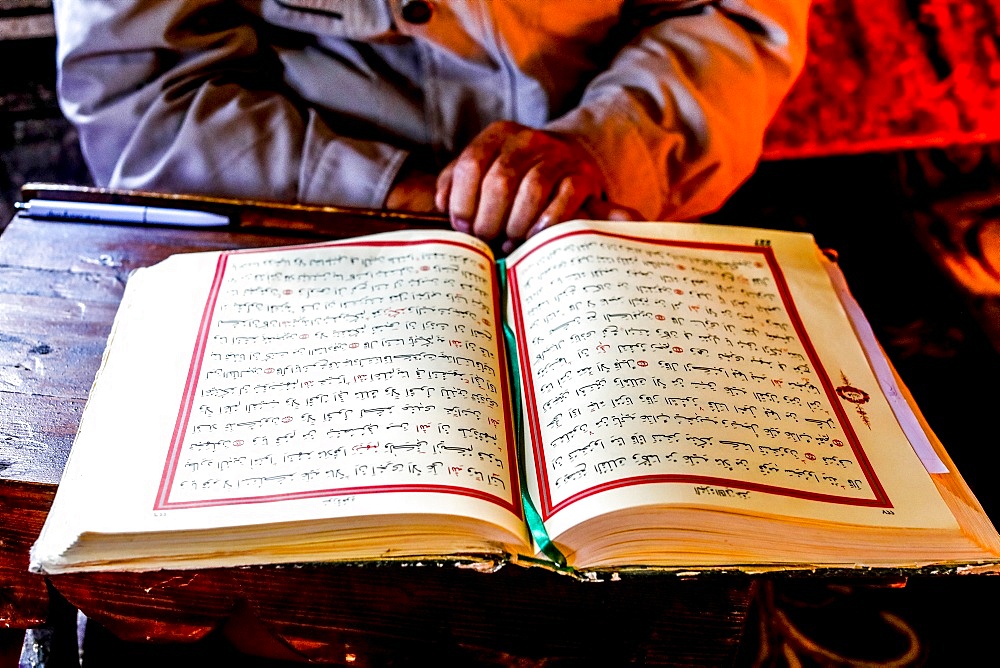 Macedonian Muslim reading the Koran, Pasha Mosque, the painted mosque of Tetovo, Republic of Macedonia, Europe