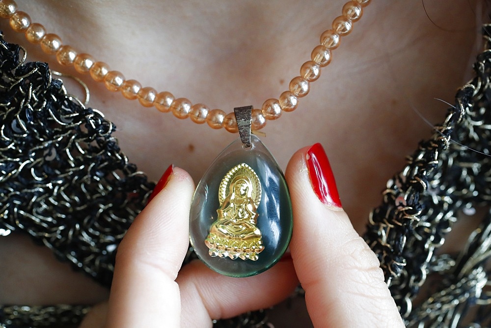 Buddhist woman with a Buddha pendant, Vung Tau, Vietnam, Indochina, Southeast Asia, Asia