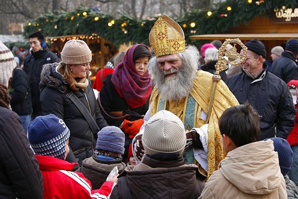 St. Nicholas impersonator at Munich Christmas market, Munich, Bavaria, Germany, Europe