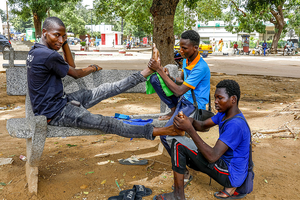 Street pedicure in central Thies, Senegal, West Africa, Africa