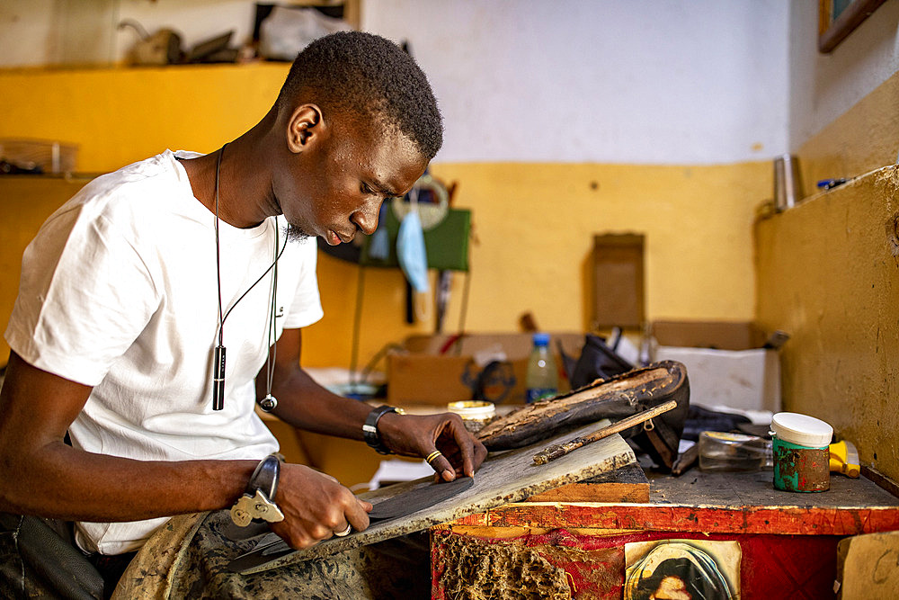 Cobbler in the craftsmen's village, Thies, Senegal, West Africa, Africa