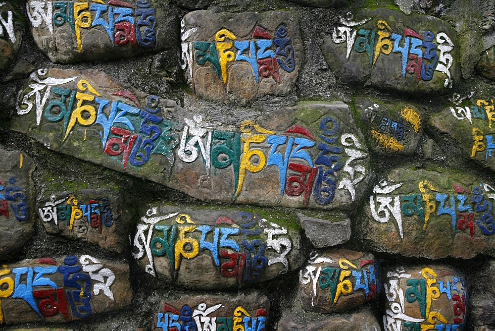 Close-up of Mani stones, Swayambhunath temple, Kathmandu, Nepal, Asia