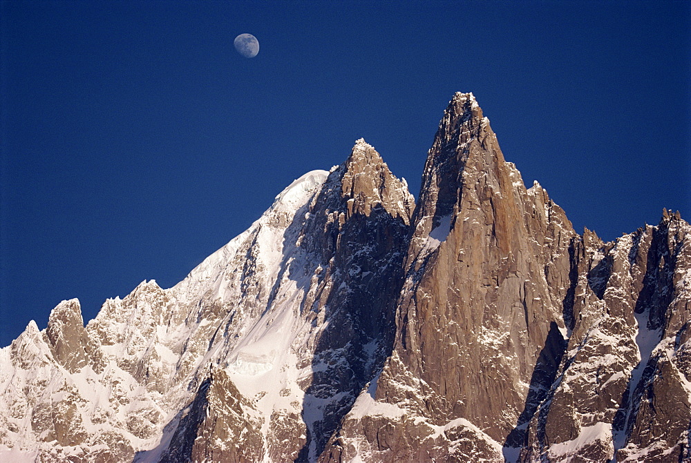 Jagged peak of Aiguille du Dru and the moon, Chamonix, Rhone Alpes, France, Europe