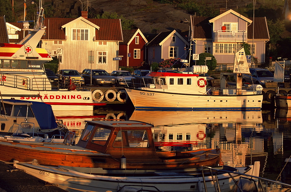 Sundown over South Harbour, village of Fjallbacka, Bohuslan, Sweden, Scandinavia, Europe