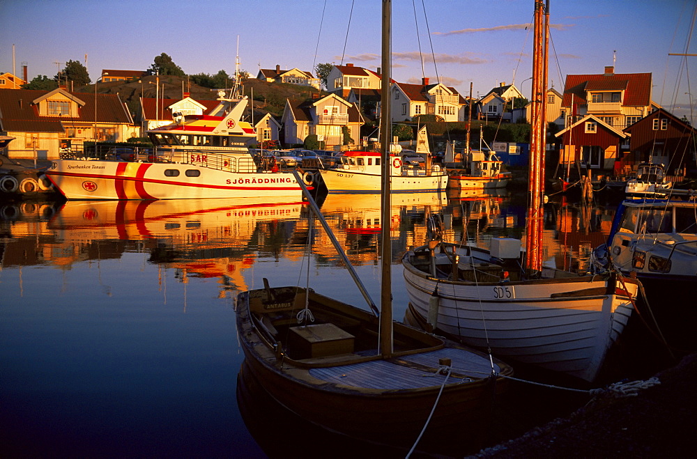 Sundown over South Harbour, village of Fjallbacka, Bohuslan, Sweden, Scandinavia, Europe