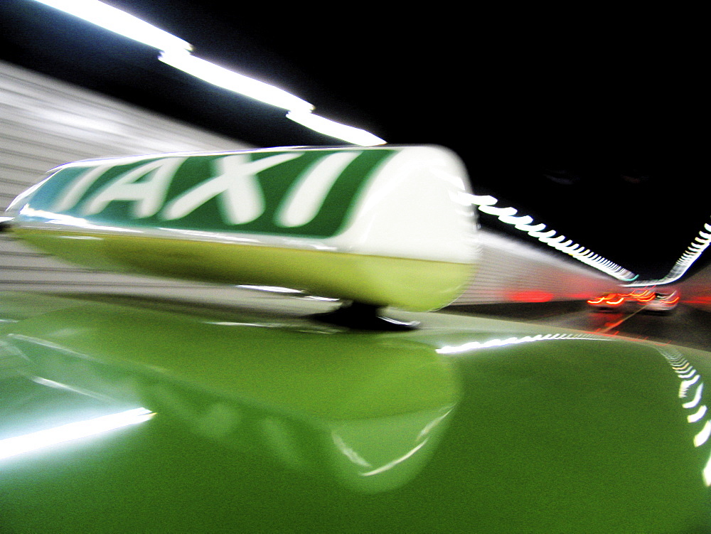 Close up of Taxi sign on car roof in tunnel, Shanghai, China, Asia