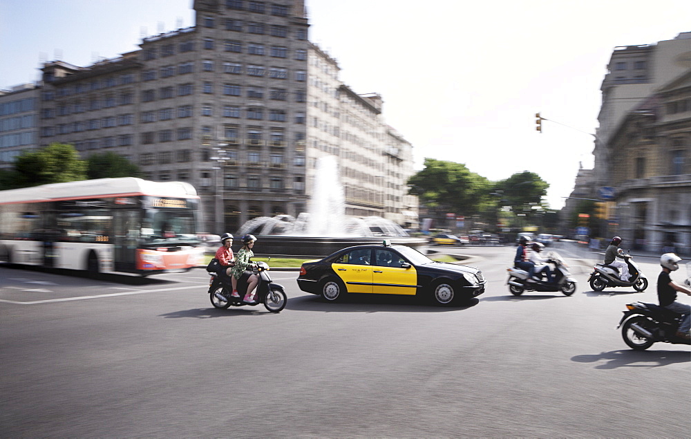 Mopeds, taxi and bus, Barcelona, Catalonia, Spain, Europe