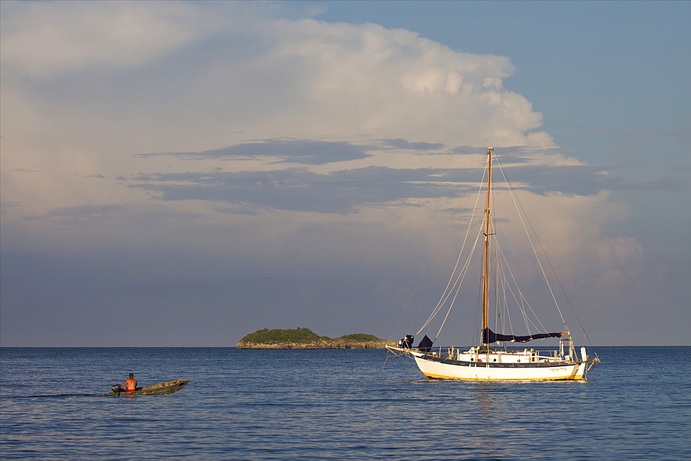 A sailing boat anchored in front of Cat Island, Bahamas, West Indies, Caribbean, Central America