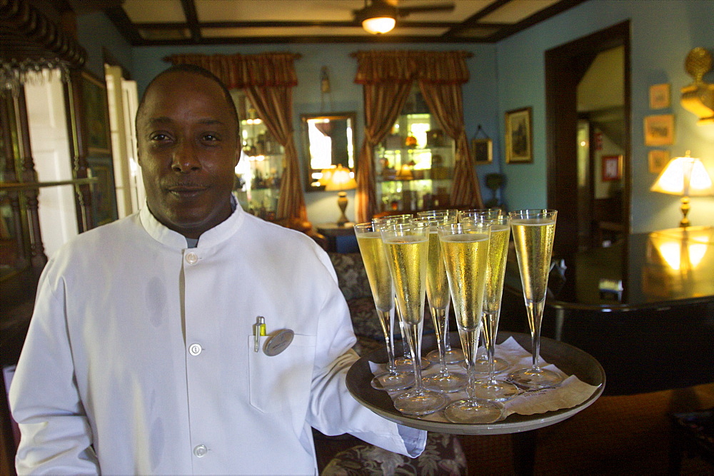 Waiter in the lounge of the Graycliff Hotel, Nassau, Bahamas, West Indies, Caribbean, Central America