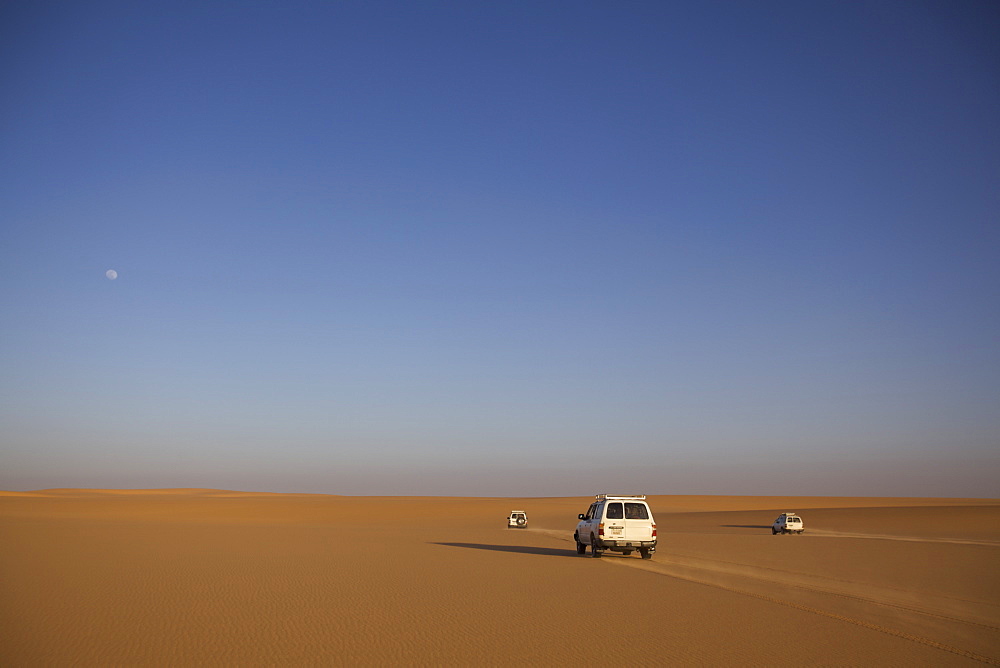 Three 4x4 vehicles in the Fezzan desert, Libya, North Africa, Africa