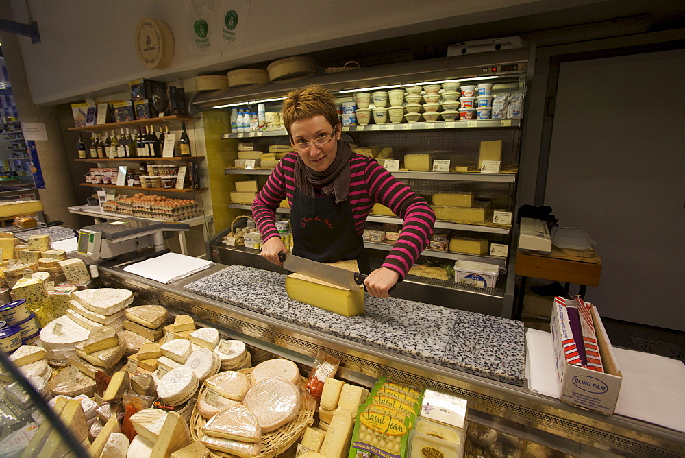 A cheese shop at the market of Besancon, Doubs, Franche-Comte, France, Europe