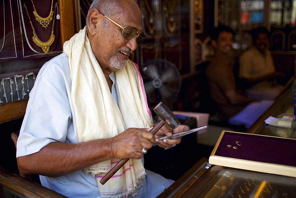 A gold jeweller in a small market in the city of Thuckalay in south Kerala, India, Asia