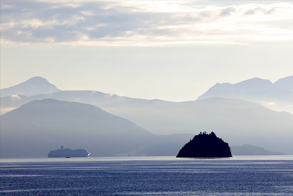 A Hurtigruten cruise boat in the fjords of Norway, Scandinavia, Europe 