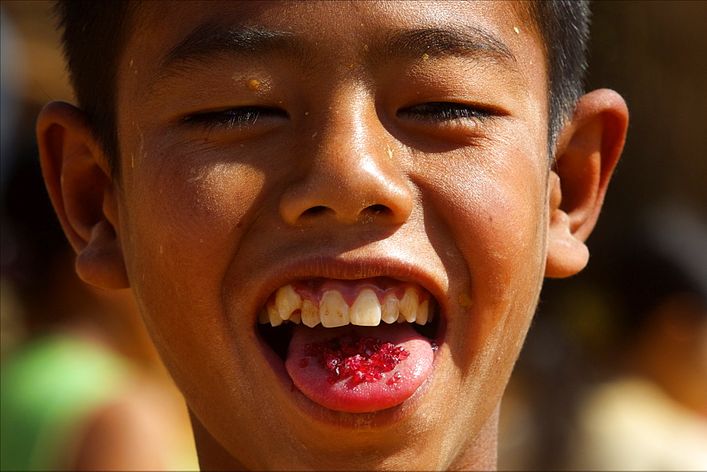 To protect the stones, children put them in their mouths during mining, Mogok, Myanmar (Burma), Asia