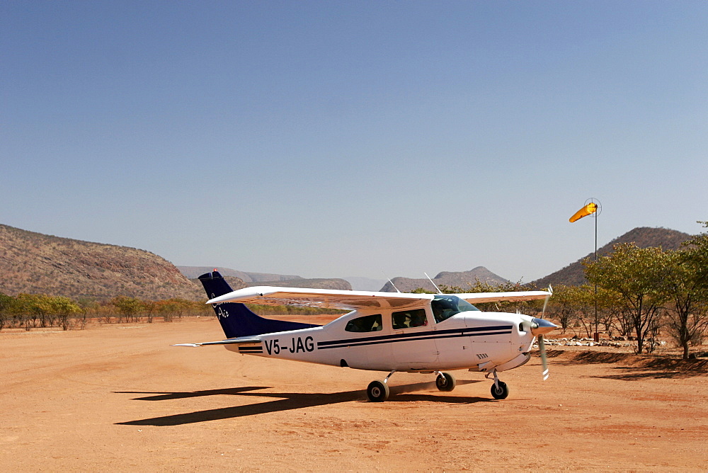 Small Cessna at Kunene River camp, close to Epupa Falls, Namibia, Africa