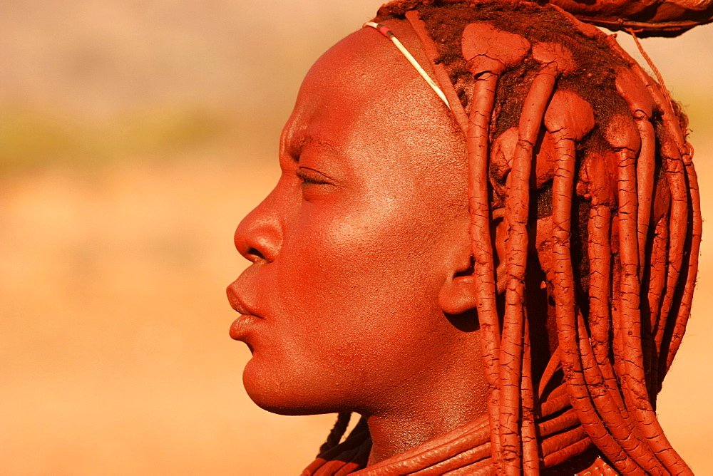 Young Himba woman from the Kunene River, on the border with Angola, Namibia, Africa