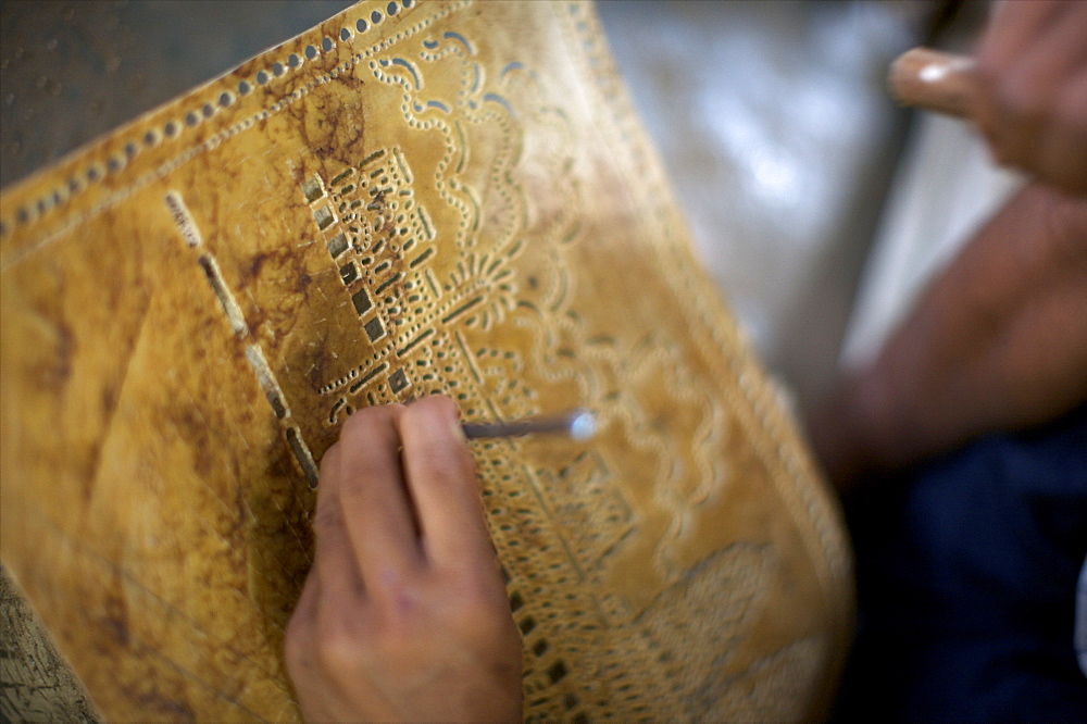 Child working on a classical handicraft in Siem Reap, Cambodia, Indochina, Southeast Asia, Asia