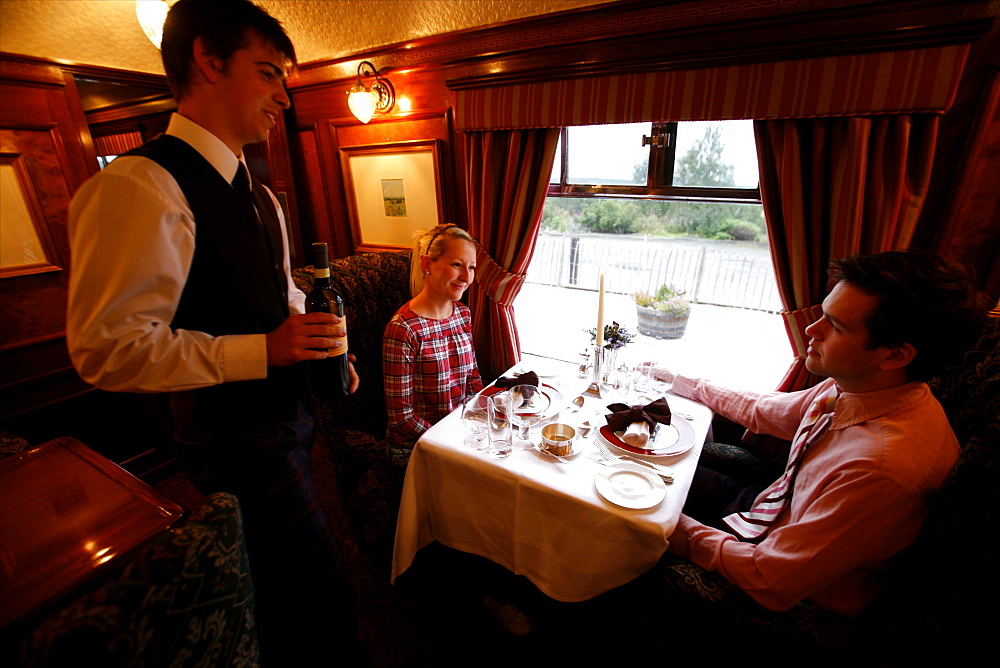 In the cosy dining car of the Royal Scotsman train, Scotland, United Kingdom, Europe