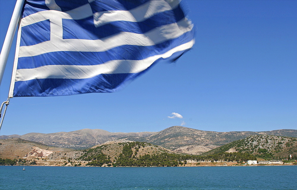 Cephalonia and Greek flag on a ferry boat on the west coast of the island, Ionian Islands, Greek Islands, Greece, Europe