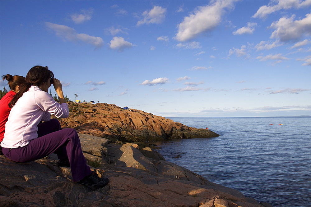 Watching for the whales around Les Bergeronnes, on the St. Lawrence River, Quebec, Canada, North America