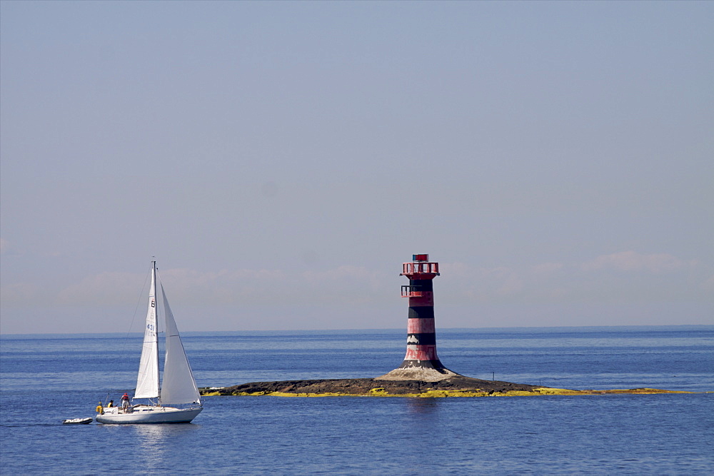 Sailing along the coast of the Kobba Klintar island in the Aland archipelago, Finland, Scandinavia, Europe