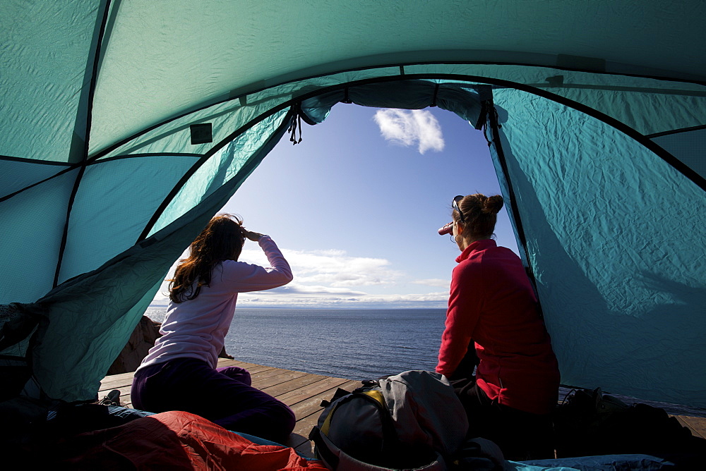 Campers whale watching on the shore of the St. Lawrence River, Quebec, Canada, North America