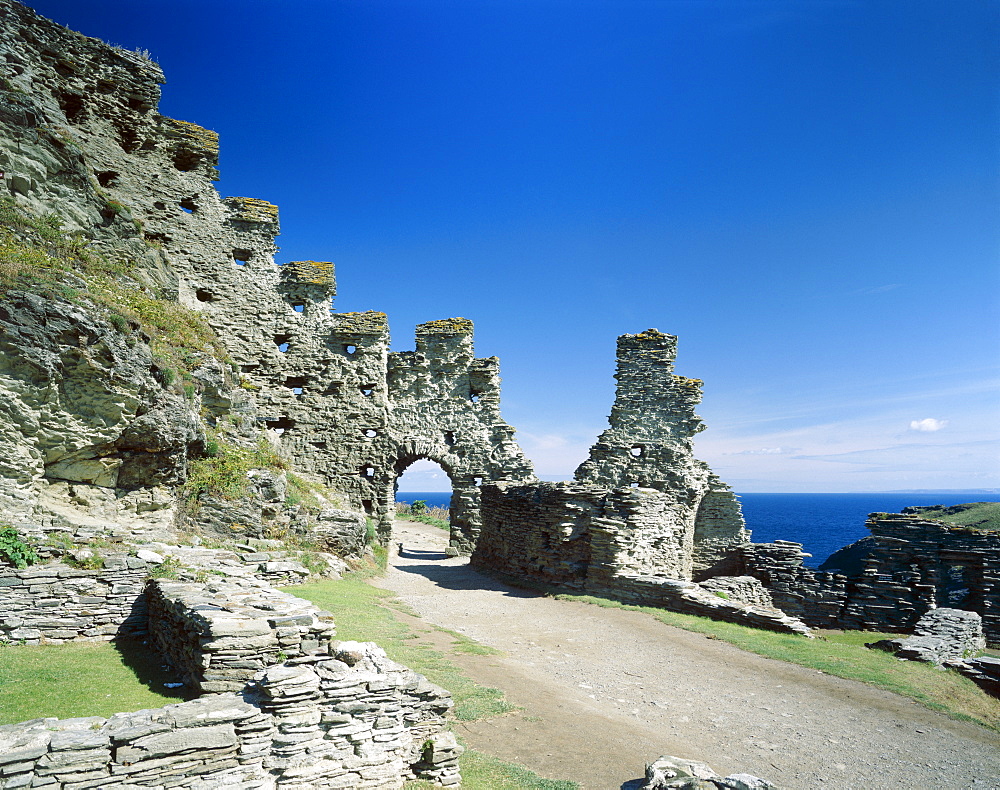 View of castle walls with sea behind, Tintagel Castle, Cornwall, England, United Kingdom, Europe


