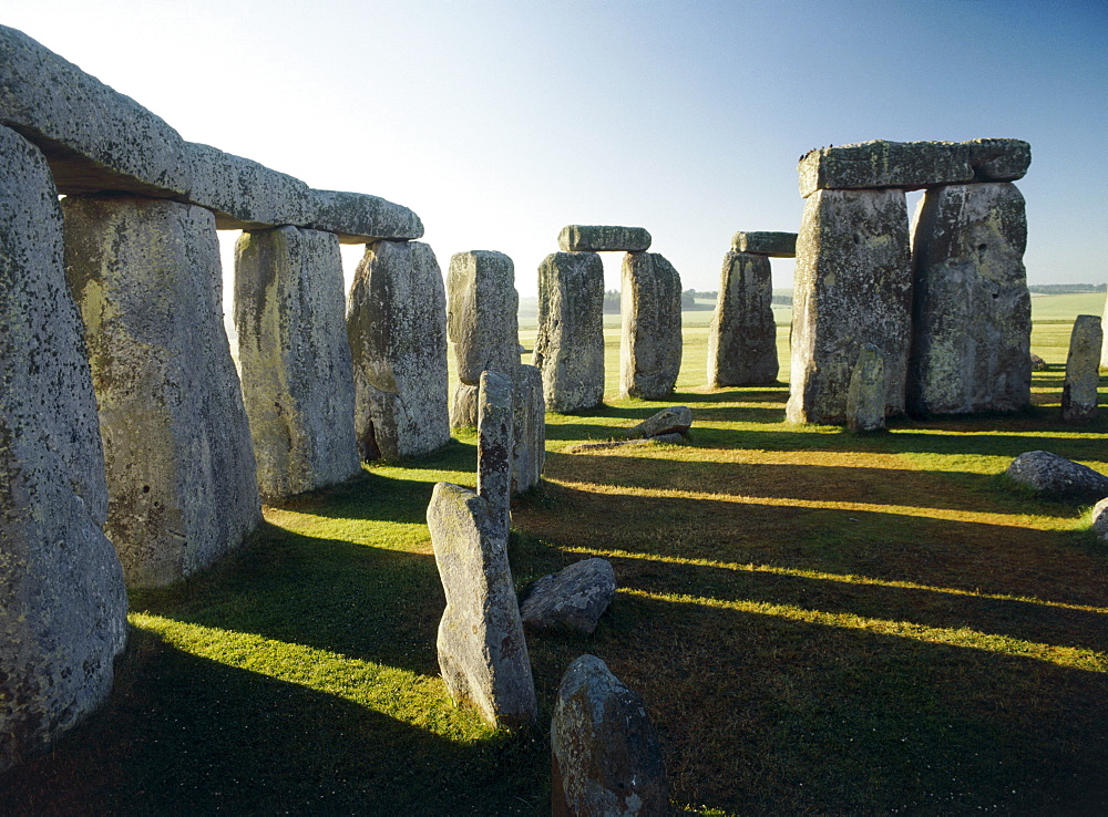 View from north towards sarsen circle bluestones and one trilithon, Stonehenge, UNESCO World Heritage Site, Wiltshire, England, United Kingdom, Europe