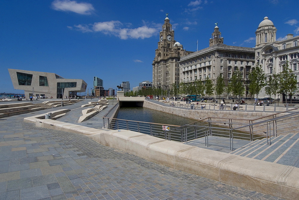 New Liverpool Museum and Leeds Liverpool Canal link in front of the Three Graces (the Liver, Cunard and Port of Liverpool Buildings), Liverpool, Merseyside, England, United Kingdom, Europe