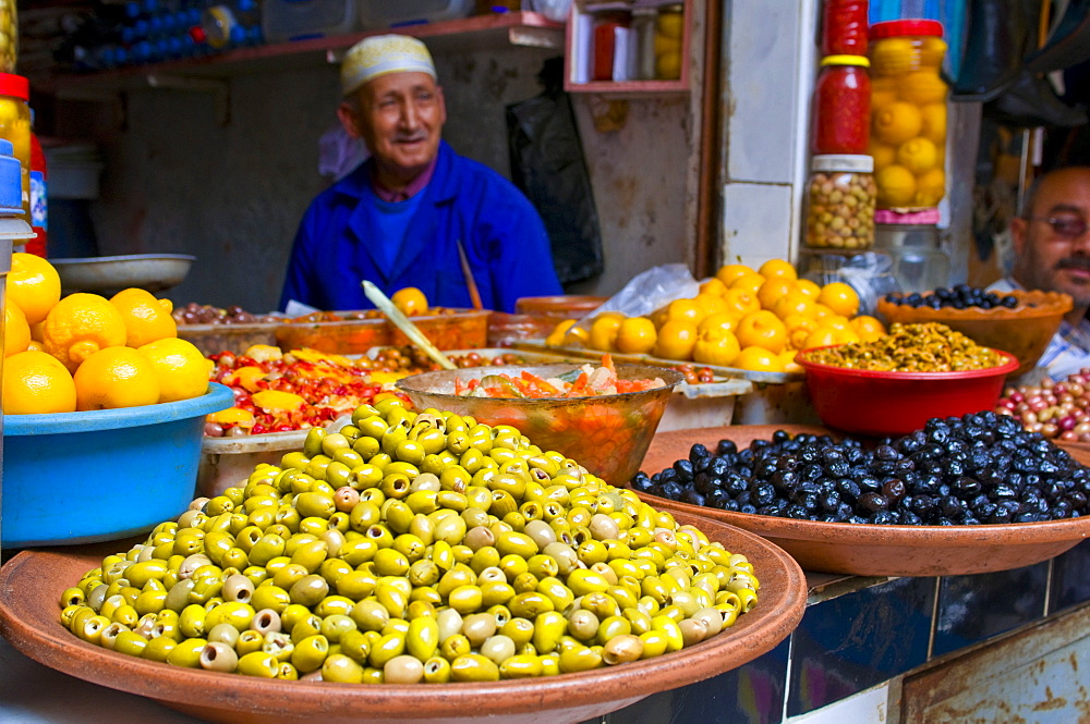 Old man selling vegetables and olives in the bazaar of Safi, Morocco, North Africa, Africa