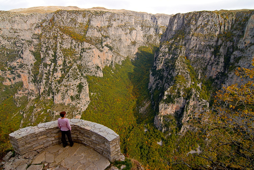 Woman looking at the Vikos Gorge, Epiros, Greece, Europe