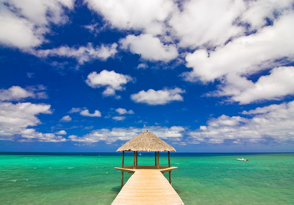 Covered Pier in the turquoise water of the Indian Ocean on the beach of Longoni, Mayotte, Indian Ocean, Africa