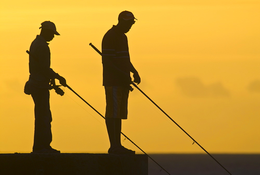 Fishermen waiting for their catch, Saint Gilles des Baines, La Reunion, Indian Ocean, Africa