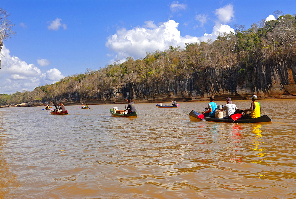 Tourists paddling along the Manambolo River, Tsingy de Bemaraha, Madagascar, Africa