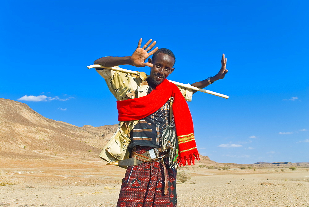 Afar tribesman on his way home, near Lac Abbe, Republic of Djibouti, Africa