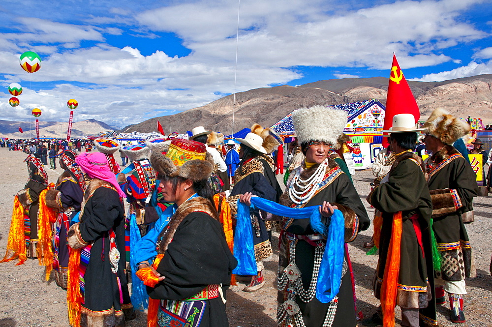 Traditionally dressed Tibetans participating at a local festival, Gerze, Tibet, China, Asia