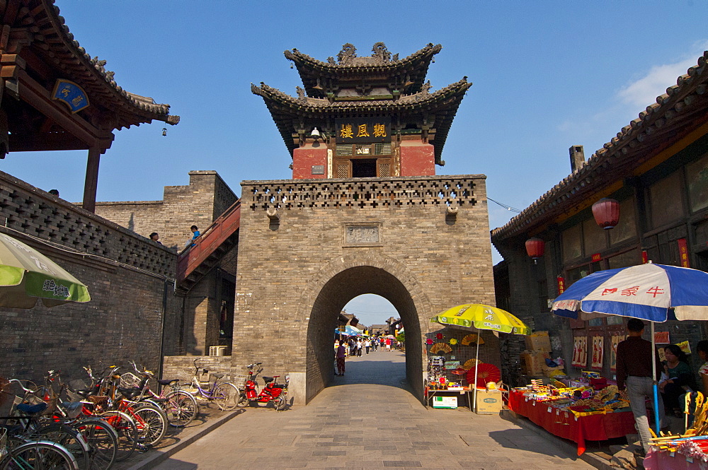 Stone gate in Pingyao, renowned for its well-preserved ancient city wall, UNESCO World Heritage Site, Shanxi, China, Asia