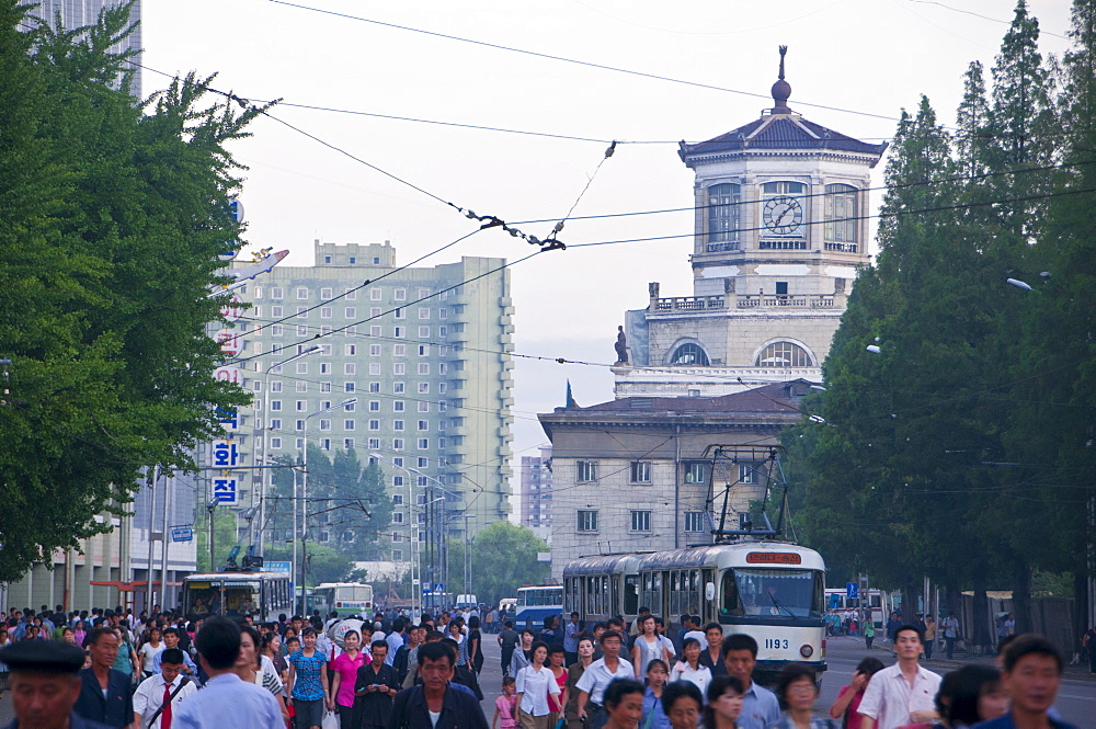 Busy street in front of the Pyongyang railway station, Pyongyang, North Korea, Asia