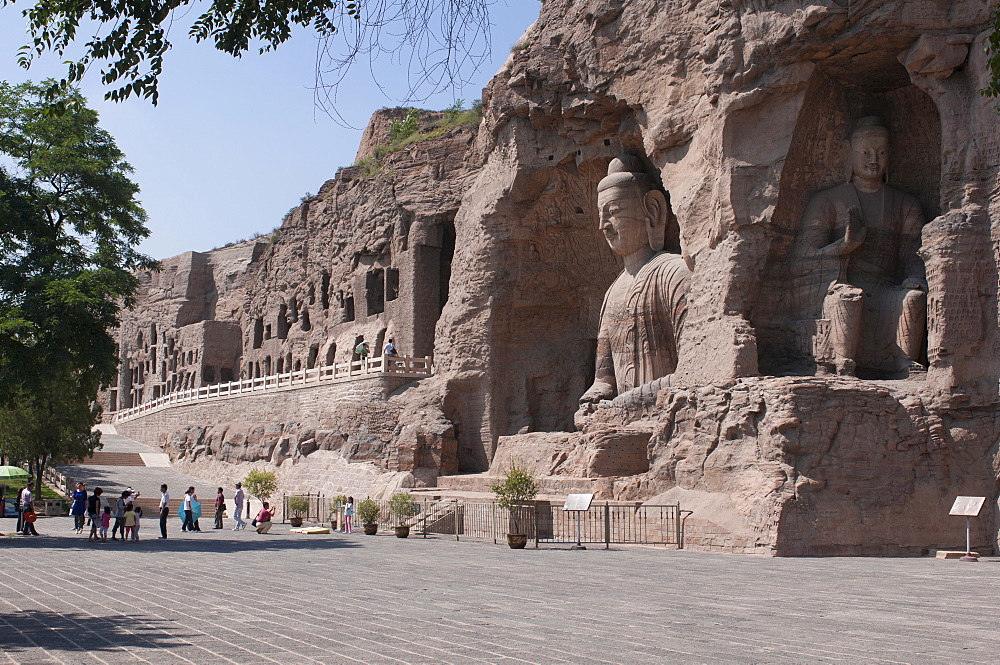 Giant Buddhas at the Yungang Grottoes, ancient Buddhist temple grottoes near the city of Datong, UNESCO World Heritage Site, Shanxi, China. Asia