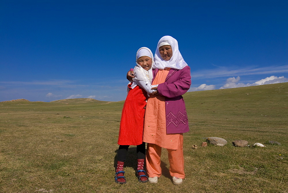 Friendly Nomad mother and daughter, Song Kol, Kyrgyzstan, Central Asia, Asia