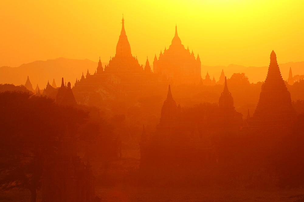 Silhouettes of the temples of the ruined city of Bagan at sunrise, Myanmar, Asia